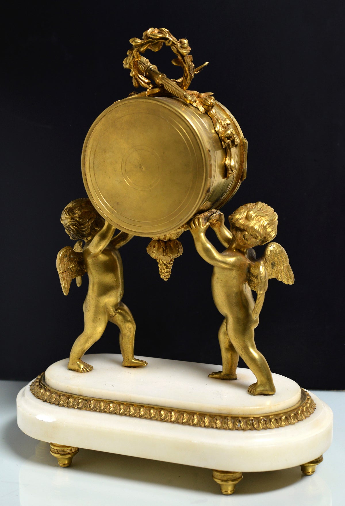 French Empire Gilt Bronze Desk Clock with Cupids and Garland n Marble base