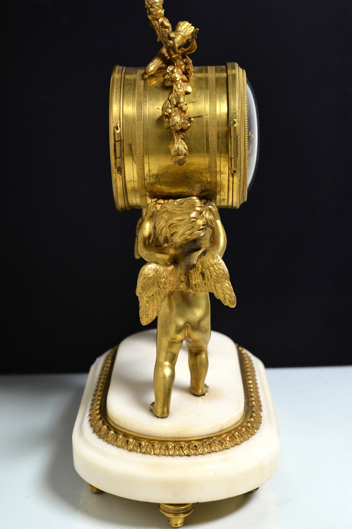 French Empire Gilt Bronze Desk Clock with Cupids and Garland n Marble base