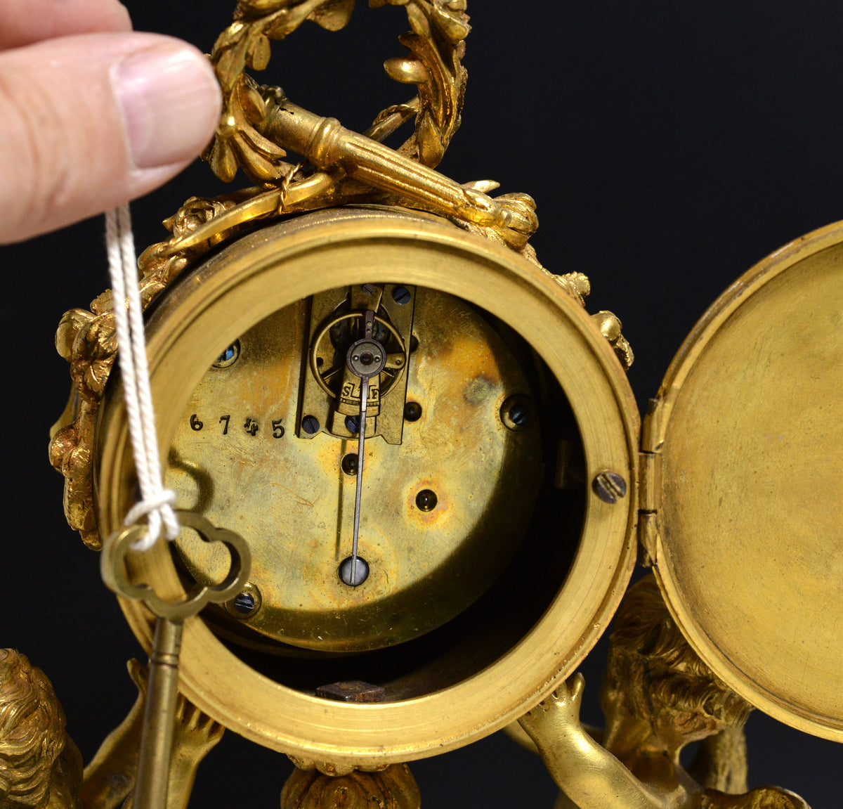 French Empire Gilt Bronze Desk Clock with Cupids and Garland n Marble base